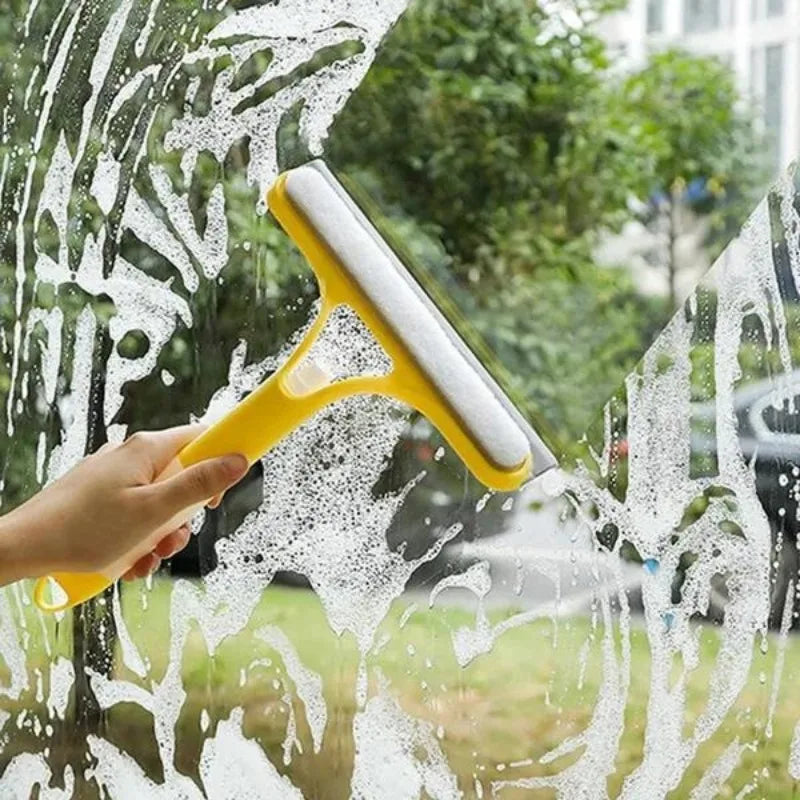 Window cleaning squeegee with detergent sprayer