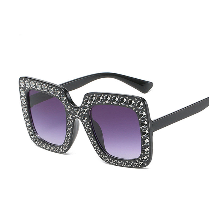 Large diamond-embellished sunglasses