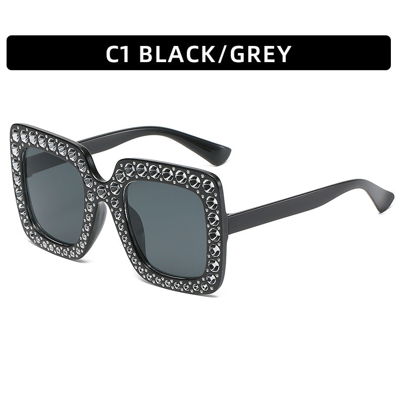 Large diamond-embellished sunglasses
