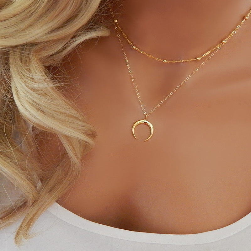 Double horn necklace