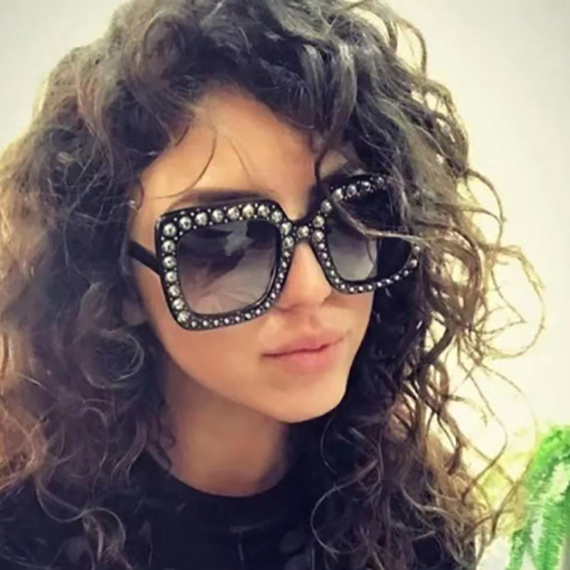 Large diamond-embellished sunglasses